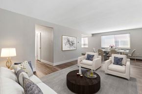 Denver apartment for rent - a living room with couches and a coffee table