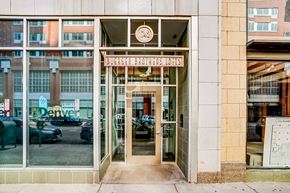 Denver apartment for rent - The entrance to a building with a sign that reads "Burger King".
