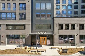 Denver apartment for rent - The image shows a modern building with the word "OSO" prominently displayed above the entrance.