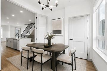 Denver townhouse for rent - A dining room with a table and chairs.