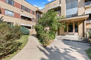 Denver apartment for rent - the entrance to an apartment building with a sidewalk in front of it