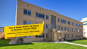 Denver apartment for rent - A building with a sign offering free parking for a month if you tour and apply within 48 hours.