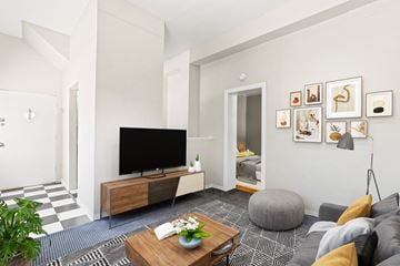 Denver apartment for rent - a living room with a couch and a tv