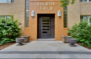 Denver apartment for rent - The entrance to Eugene Field building is framed by two lights.