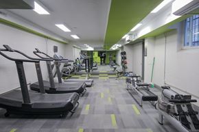 Denver apartment for rent - A gym with treadmills and elliptical machines.