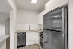 Denver apartment for rent - A modern kitchen with a stainless steel refrigerator.