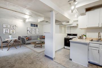 Denver apartment for rent - a living room with a kitchen and a table