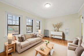 Denver apartment for rent - a living room with a couch and a table