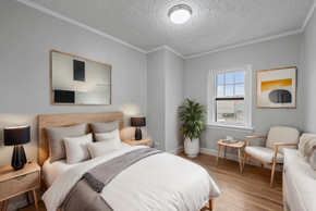 Denver apartment for rent - a bedroom with a bed and a window