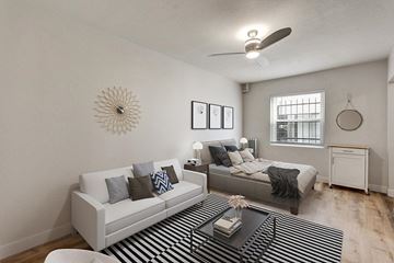 Denver apartment for rent - a living room with two couches and a coffee table