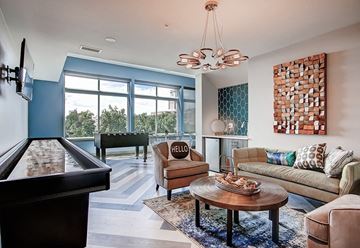 Denver apartment for rent - A living room with a pool table and a couch.