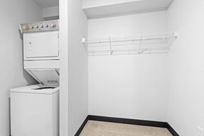 Denver apartment for rent - a white kitchen with a white stove and a white refrigerator
