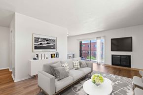 Glendale apartment for rent - a living room with a couch and a table and a television