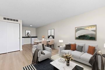 Denver apartment for rent - our apartments offer a living room and dining room with white furniture