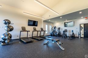 Elkhorn apartment for rent - A gym with treadmills, exercise bikes, and other equipment.