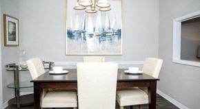 Bradenton apartment for rent - a dining room with a table and chairs