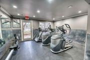 Austin apartment for rent - Fitness center with cardio equipment and floor mats at Le Montreaux Apartments, Austin, TX 78759
