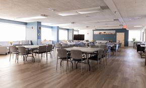 Medford apartment for rent - A conference room with a long table and chairs.