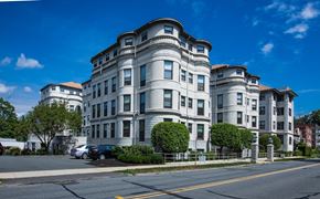Greenfield apartment for rent - an apartment building on the corner of a city street