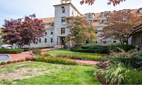 Whitinsville apartment for rent - a garden in front of a building