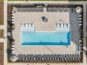 Knoxville apartment for rent - An aerial view of a pool surrounded by a concrete wall.