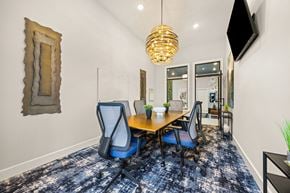 Knoxville apartment for rent - A conference room with a large table and chairs.