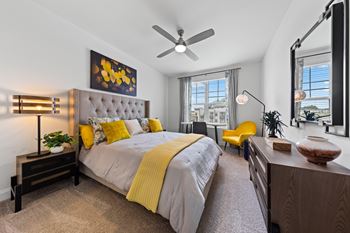 Bedroom with window and ceiling fan