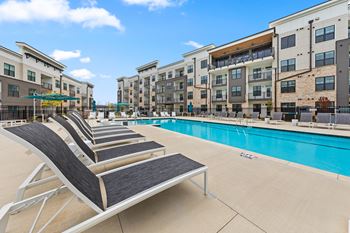 Pool with sun loungers