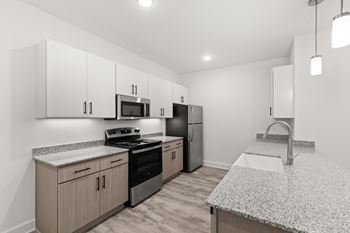 Kitchen with white cabinetry