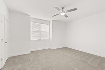 Empty room with carpeted floor