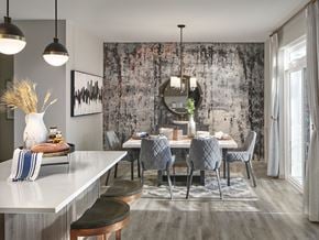 Milford apartment for rent - a dining room with a table and chairs and a mirror