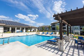 San Antonio apartment for rent - our apartments have a large swimming pool with lounge chairs
