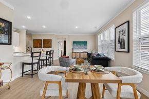 Liberty Township townhouse for rent - A dining room with a wooden table and chairs.