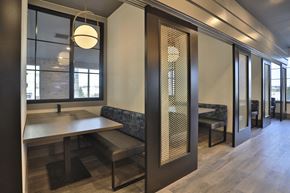 Cincinnati apartment for rent - a dining area with a table and chairs and a glass door