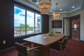 Liberty Township townhouse for rent - A conference room with a long table and chairs.