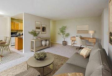 Laurel apartment for rent - a living room with a couch and a table