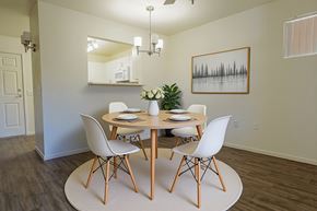 Las Vegas apartment for rent - A dining room with a round table and chairs.