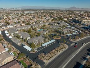 Henderson apartment for rent - A bird's eye view of a residential area with a road running through it.