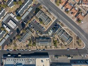 Henderson apartment for rent - A bird's eye view of a road intersection with cars and buildings.