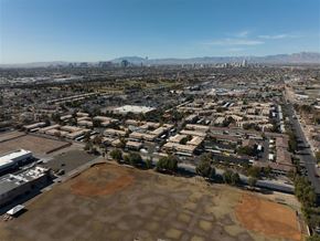 Las Vegas apartment for rent - A cityscape with buildings and a baseball field in the foreground.