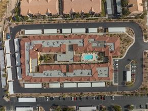 Las Vegas apartment for rent - an aerial view of a building with a parking lot