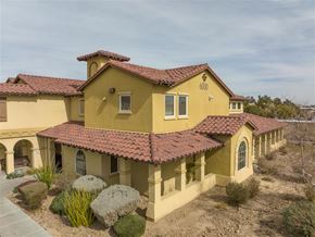 Las Vegas apartment for rent - a house with a yellow exterior and a red roof
