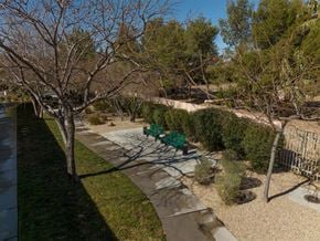 Las Vegas apartment for rent - A park with a bench and a tree.
