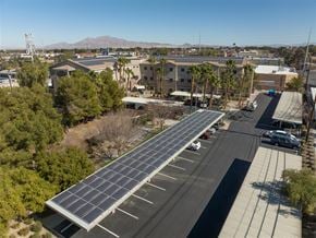 Las Vegas apartment for rent - A parking lot with a long row of solar panels on the roof.