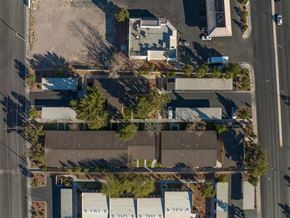 Las Vegas apartment for rent - A bird's eye view of a residential area with houses and trees.