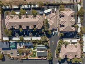 N. Las Vegas apartment for rent - A bird's eye view of a residential area with houses and streets.