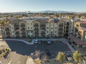 North Las Vegas apartment for rent - A parking lot in front of apartment buildings.