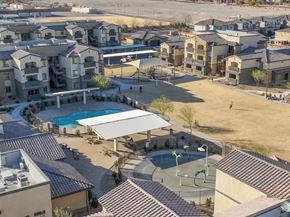 Las Vegas apartment for rent - an aerial view of a community with a pool and buildings
