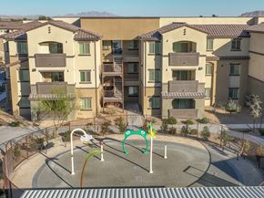 Las Vegas apartment for rent - an aerial view of an empty playground in front of an apartment building