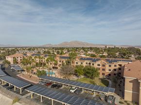 Las Vegas apartment for rent - A parking lot with solar panels on the roof.